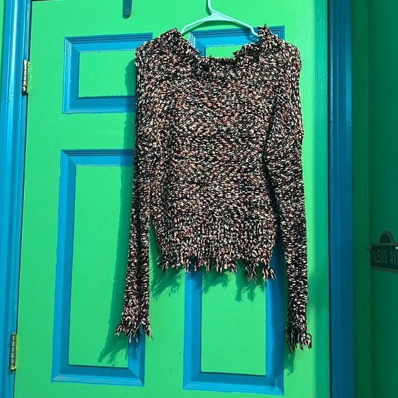 “Torn” sweater sized medium only wore a couple of times no holes. - Picture 2 of 4